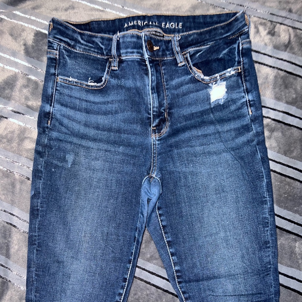 AE skinny jeans ripped size 10